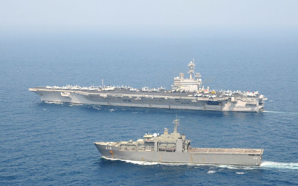 1280px-us_navy_111115-n-tu894-077_the_aircraft_carrier_uss_george_h-w-_bush_cvn_77_is_underway_with_the_singapor_navy_tank_landing_ship_rss_endeavour_2
